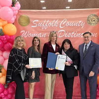 Northport Village resident and Suffolk County Woman of Distinction Linda Oristano (second from right) with Legislator Stephanie Bontempi (center) and Suffolk County Executive Ed Romaine.